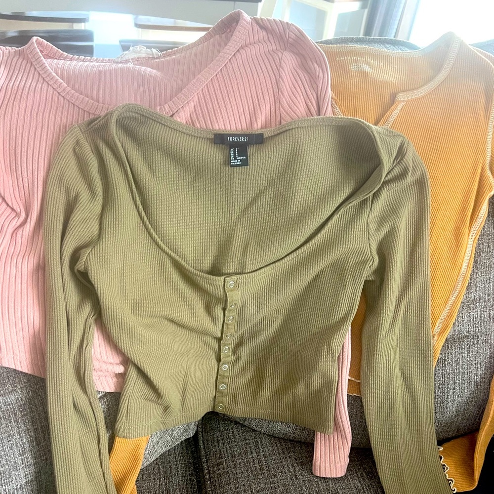 Three tops- lower cut- all long sleeve